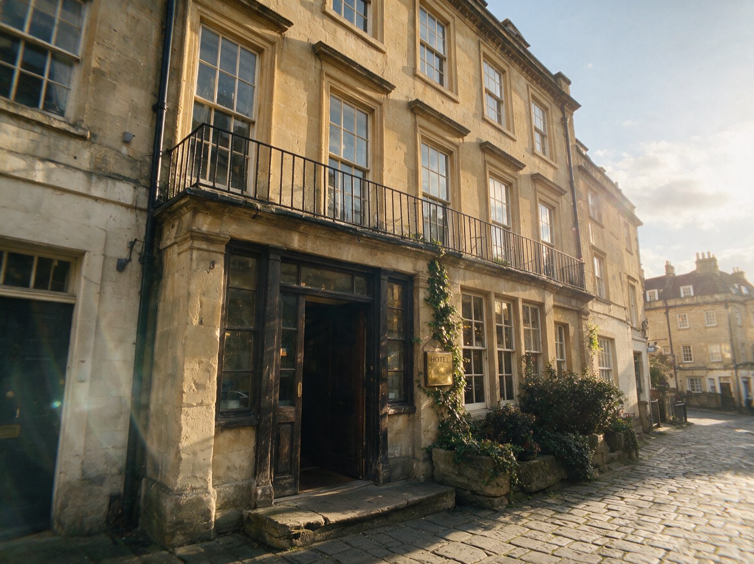 The Georgian stone facade of CloudSaveCircuit in golden afternoon light